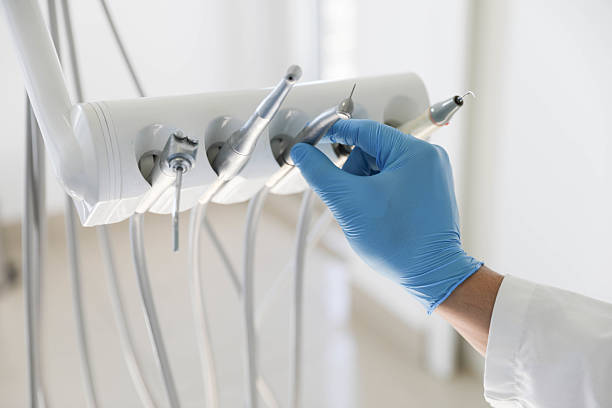 Professional Tooth Extraction technician working in Newburyport, MA